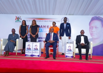 Chief Justice Dr.Flavian Zeija, Principal judge Jane Frances Abodo (seated) with the family of the late Joan Kagezi at the eighth Memorial Lecture.